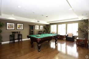 Westminster apartment for rent - a game room with a pool table in the center