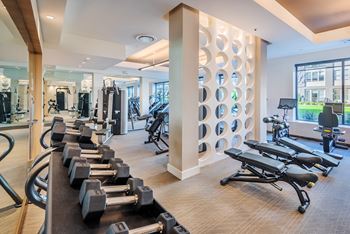 24-Hour fitness center with technogym and peloton on-demand bikes