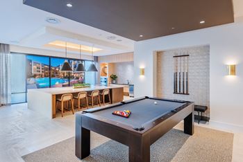 Resident clubhouse with smart tv lounge and billiards