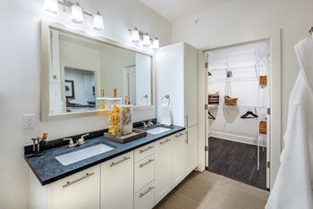 Dual-vanity countertops, walk-in showers & linen closets*