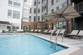 Durham apartment for rent - a swimming pool with chairs and umbrellas