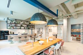 Raleigh apartment for rent - a dining room with a wooden table and chairs and a kitchen in the background