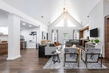 Durham apartment for rent - a living room with couches and chairs and a tv