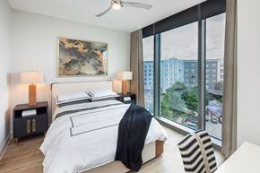 Raleigh apartment for rent - Bedrooms feature ceiling fans and blackout roller shades