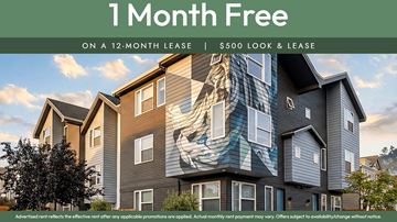 Oakland apartment for rent - A building with a large mural on its side is advertising a free month on a 12-month lease.