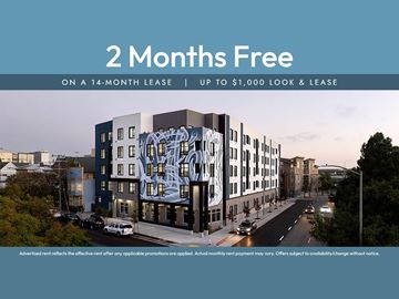 Oakland apartment for rent - A building with a large mural on the side and the text "2 Months Free on a 14-month lease | up to $1,000 look & lease".