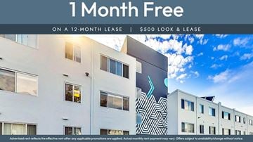 Oakland apartment for rent - A building with a sign that says "1 Month Free on a 12-month lease | $500 look & lease".