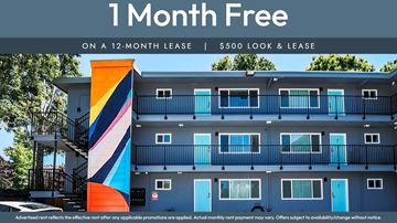 Oakland apartment for rent - A building with a sign that says "1 Month Free on a 12-month lease | $500 look & lease".