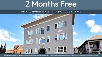 Oakland apartment for rent - A building with a sign offering 2 months free on a 12-month lease.