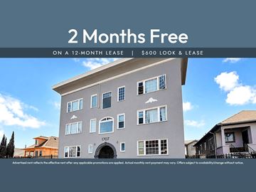 Oakland apartment for rent - A building with a sign that says "2 Months Free on a 12-month lease | $600 look & lease".