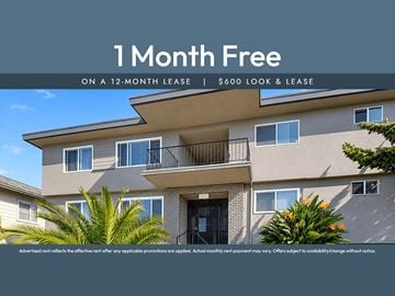 Oakland apartment for rent - A building with a sign that says "1 Month Free on a 12-month lease | $600 look & lease".