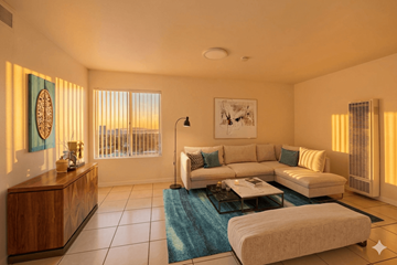 Oakland apartment for rent - A living room with a white couch and a wooden cabinet.