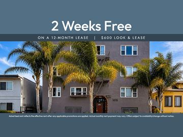 Oakland apartment for rent - A building with a sign that says "2 Weeks Free on a 12-month lease | $600 look & lease".