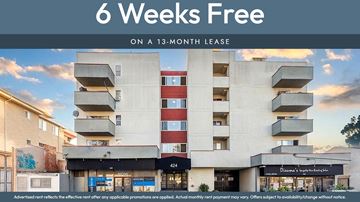 Oakland apartment for rent - A building with a sign that says "6 Weeks Free on a 13-month lease".