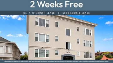 Oakland apartment for rent - A building with the number 1454 on it and a sign that says "2 Weeks Free on a 12-month lease | $500 look & lease".