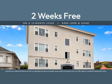 Oakland apartment for rent - A building with a sign that says "2 Weeks Free on a 12-month lease | $500 look & lease".