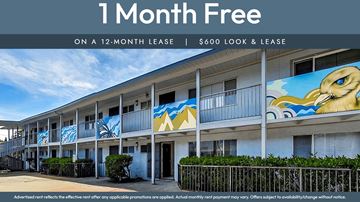 Oakland apartment for rent - A building with a mural of a fish painted on the side.