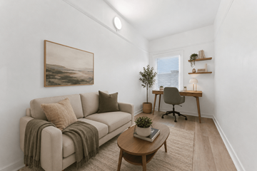 Oakland apartment for rent - A living room with a couch, a chair, a table, and a painting on the wall.