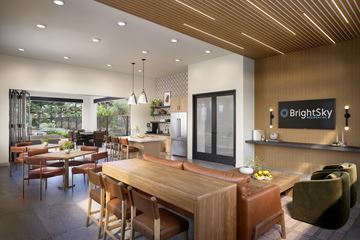 Antioch apartment for rent - A modern dining room with a wooden table and chairs.