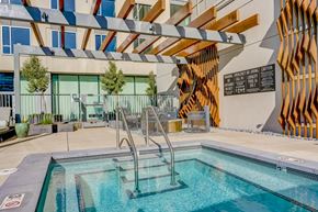 Oakland apartment for rent - A pool with a slide and a sign that says "No Diving".