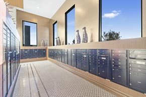 Las Vegas apartment for rent - A modern kitchen with a long counter and a tiled floor.