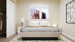 Los Angeles apartment for rent - A bedroom with a large bed and a painting on the wall at Skyview Sunset Apartments, Los Angeles, CA