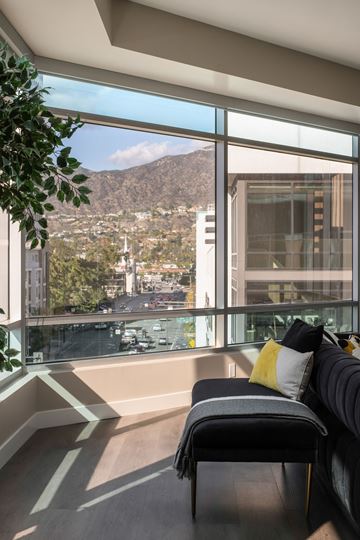 Glendale apartment for rent - A living room with a couch and a view of the city.