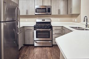 Escondido apartment for rent - One Bedroom Apartments In Escondido, CA | Alta Vista | Kitchen With Stainless Steel Appliances, And Modern Wood Cabinets