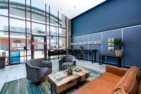 Oakland apartment for rent - furnished lobby with lounge seating at Aqua Via Apartments, Oakland, California