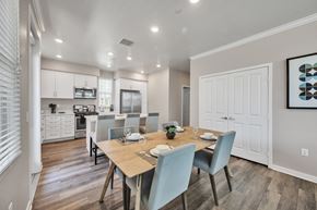 Upland apartment for rent - A dining room with a table set for four.