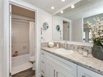 Spa-style bathrooms featuring new vanity cabinets