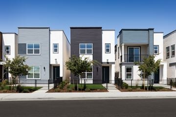 Lincoln apartment for rent - A row of modern houses with different shades of grey and white.