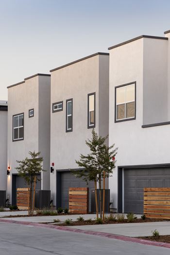 Attached 2 car garage & parking with each home (equipped to install ev charging 220v outlet)*
