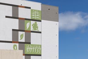South San Francisco apartment for rent - a building with logos on it against a blue sky