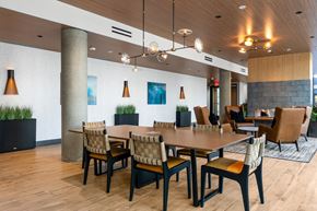 Redmond townhouse for rent - A conference room with a long table and chairs.