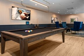 Redmond townhouse for rent - A pool table with a billiard ball on it.