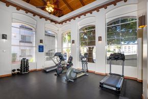 Scottsdale apartment for rent - A gym with treadmills, exercise bikes and weights.