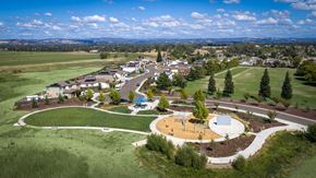 Lincoln apartment for rent - A park with a playground and a large open field.