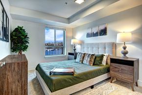 Seattle apartment for rent - Bedroom with large window at Eastlake 2851 Apartments, Seattle, WA