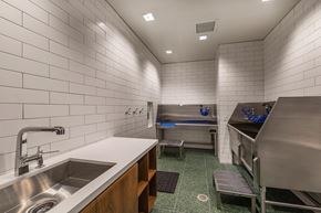 Sunnyvale apartment for rent - a kitchen with a sink and a counter and a stainless steel refrigerator