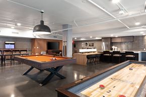 Oakland apartment for rent - a game room with a pool table and a bar