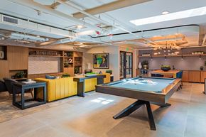 San Jose apartment for rent - social clubhouse with pool table and stylish seating area