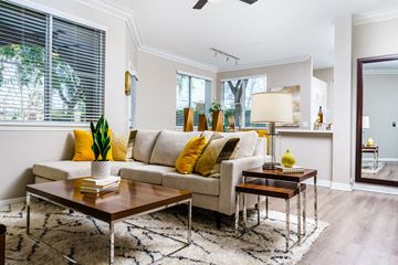 Chino Hills apartment for rent - a living room with a couch and two tables