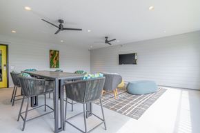 Oklahoma City apartment for rent - A dining room with a table and chairs.