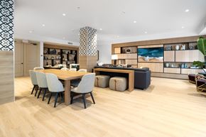 Playa Vista apartment for rent - A modern dining room with a wooden table and chairs.