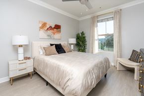 Playa Vista apartment for rent - A bedroom with a large bed, a nightstand with a lamp, and a painting on the wall.