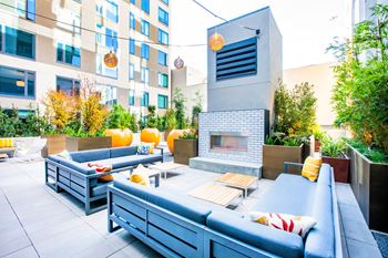 Outdoor seating area with fireplace