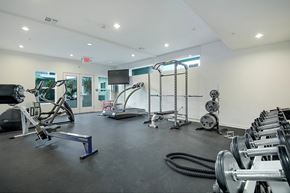 Los Angeles apartment for rent - A gym with a variety of equipment including treadmills, weights, and exercise machines.at Grand View Towers, Los Angeles, CA  