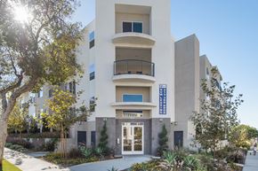 Los Angeles apartment for rent - A modern building with a balcony on the second floor.at Grand View Towers, Los Angeles, CA  