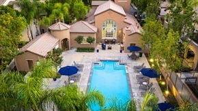 Murrieta apartment for rent - A large house with a pool in the backyard. at Sonoma at Mapleton Apartments, West Murrieta California